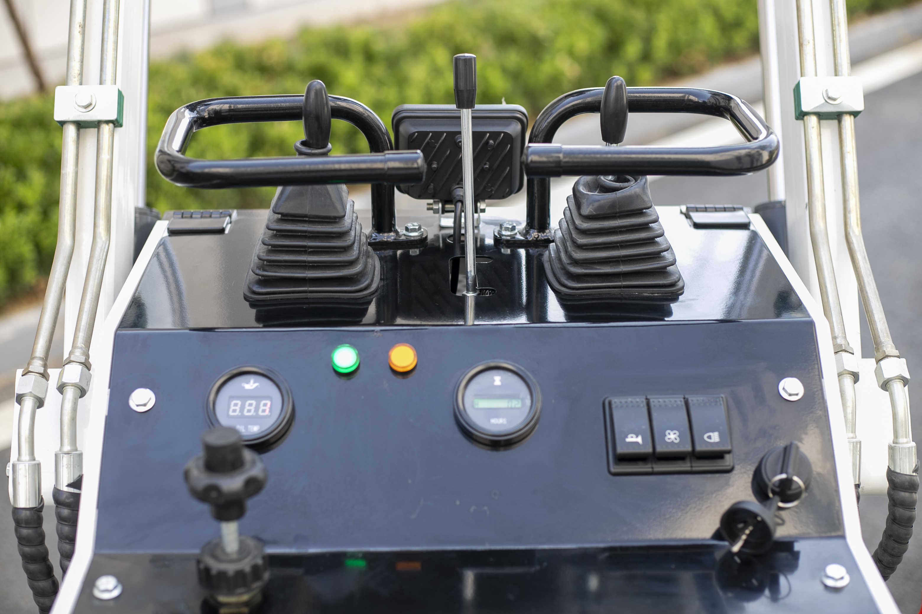 skid steer loader working with bucket attachment on construction and landscaping project