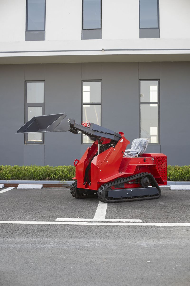 TOVISEN T490 seated track skid steer loader with bucket, product display TOVISEN T490 seated track skid steer loader with bucket, product display